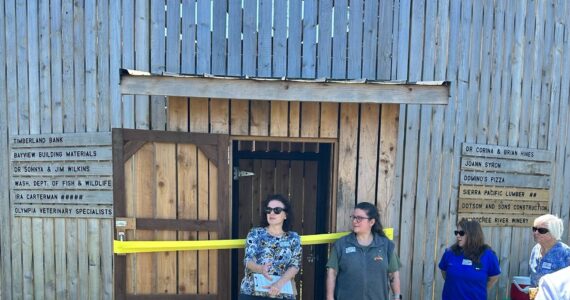 Courtesy of Jillanna Bickford / Elma Chamber of Commerce
From left, of the Twin Harbors Wildlife Center: Sonnya Wilkins, president and co-founder, Corrie Hines vice president and co-founder, and Lauri Leirdahl, secretary, at the raptor flight building’s ribbon cutting ceremony on May 16.