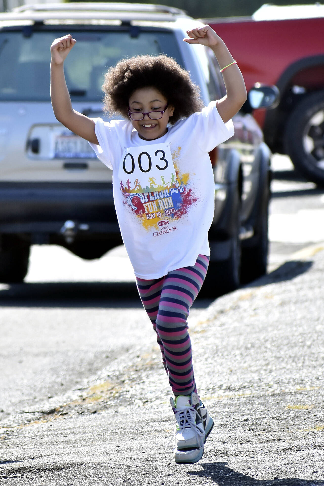 SUBMITTED PHOTO A competitor celebrates during the AJ West Elementary School Fun Run on Friday in Aberdeen.