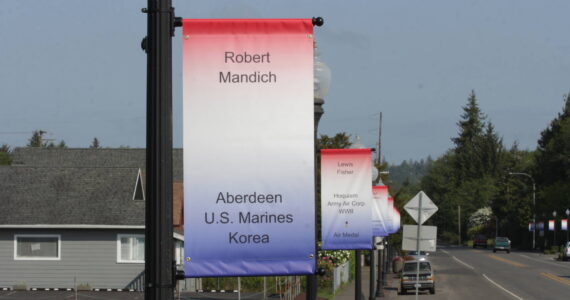 Michael S. Lockett / The Daily World
Memorial banners line the main street of Cosmopolis, the fruit of a years-long effort by a local veteran to collect the names of the war dead from the county.