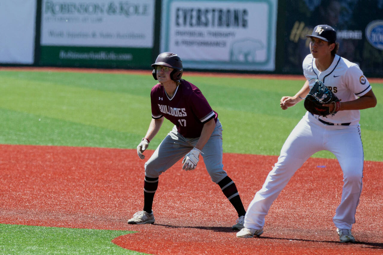ALEC DIETZ | THE CHRONICLE Montesano’s John Kling, left, navigates the base path against Naches Valley in the 1A State Tournament semifinals at Joe Martin Stadium in Bellingham Friday.