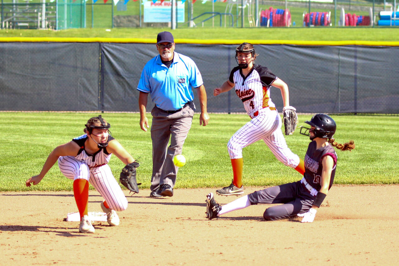 PHOTO BY SHAWN DONNELLY Montesano’s Liv Robinson (10) slides into second during the Bulldogs’ 11-0 victory over Blaine in the 1A State Softball Tournament semifinals on Saturday in Richland.