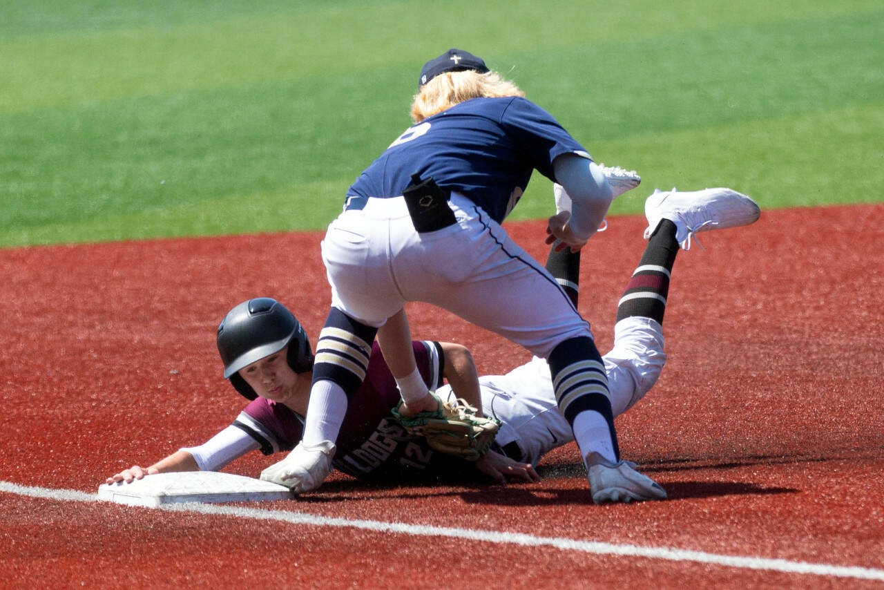 ALEC DIETZ / THE CHRONICLE
Montesano’s Tyson Perry slides into third just before the tag against Cedar Park Christian in the 1A State third-place game on Saturday at Joe Martin Stadium in Bellingham.