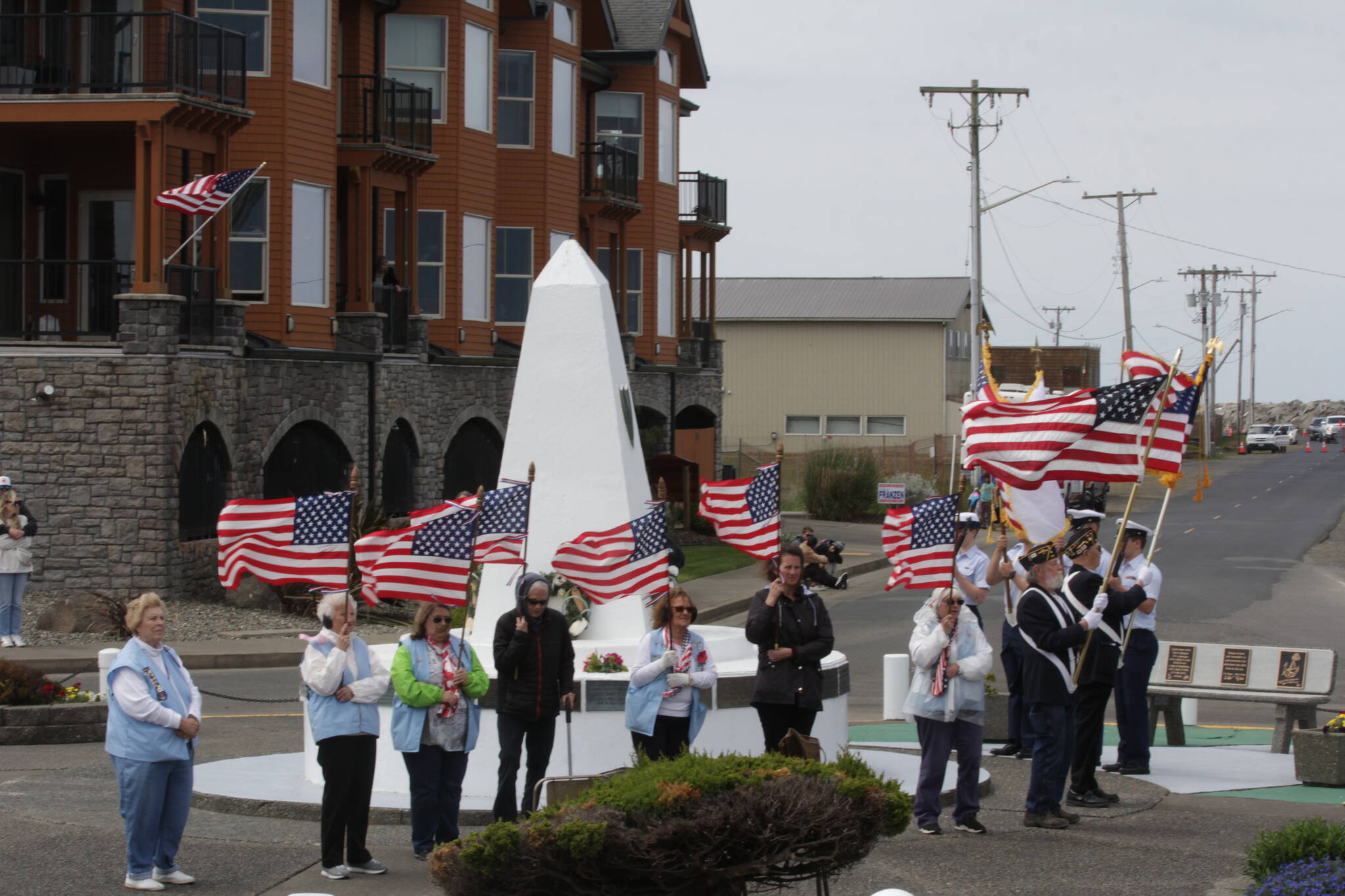 A Coast Guard color guard and veterans organizations parade the colors during the remembrance of those who put out to sea and did not return on May 28 in Westport. (Michael S. Lockett / The Daily World)