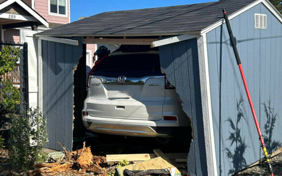 Courtesy photo / Ocean Shores Fire Department
A visitor to Ocean Shores drove through a shed Monday morning after losing consciousness.