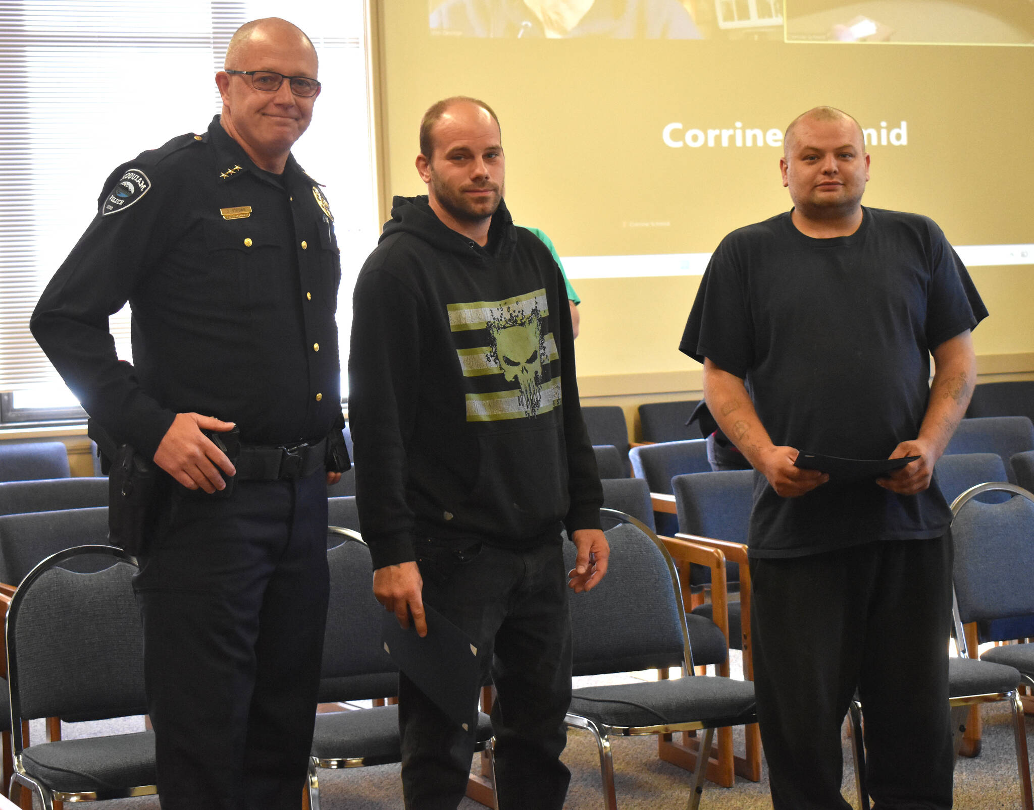 Matthew N. Wells / The Daily World
Hoquiam Police Chief Joe Strong, from left, stands with Jeffrey Alderton II and Robert Olson, whose quick thinking and decisive action helped law enforcement across Grays Harbor County rescue two children who were in a stolen minivan on May 15 in South Aberdeen.