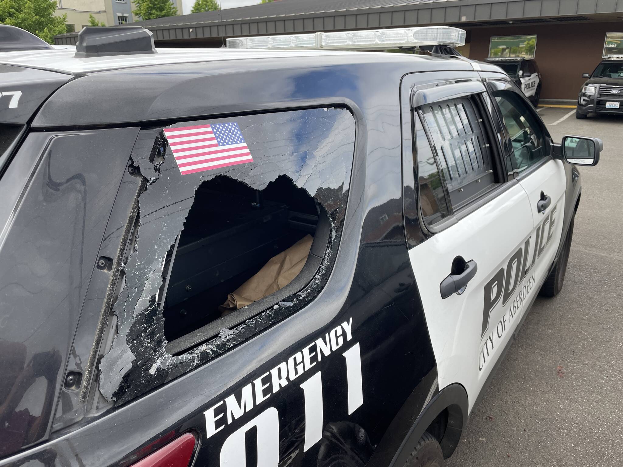 An Aberdeen man headbutted through this police car window as he was being taken to the hospital to evaluate his stupendous blood alcohol content following his arrest for assault on Saturday, July 8. (Michael S. Lockett / The Daily World)