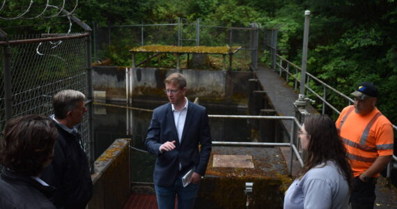Clayton Franke / The Daily World
U.S. Rep. Derek Kilmer visited the West Fork Hoquiam Dam on Monday, July 24 to talk about funding opportunities for the city’s dam removal project.