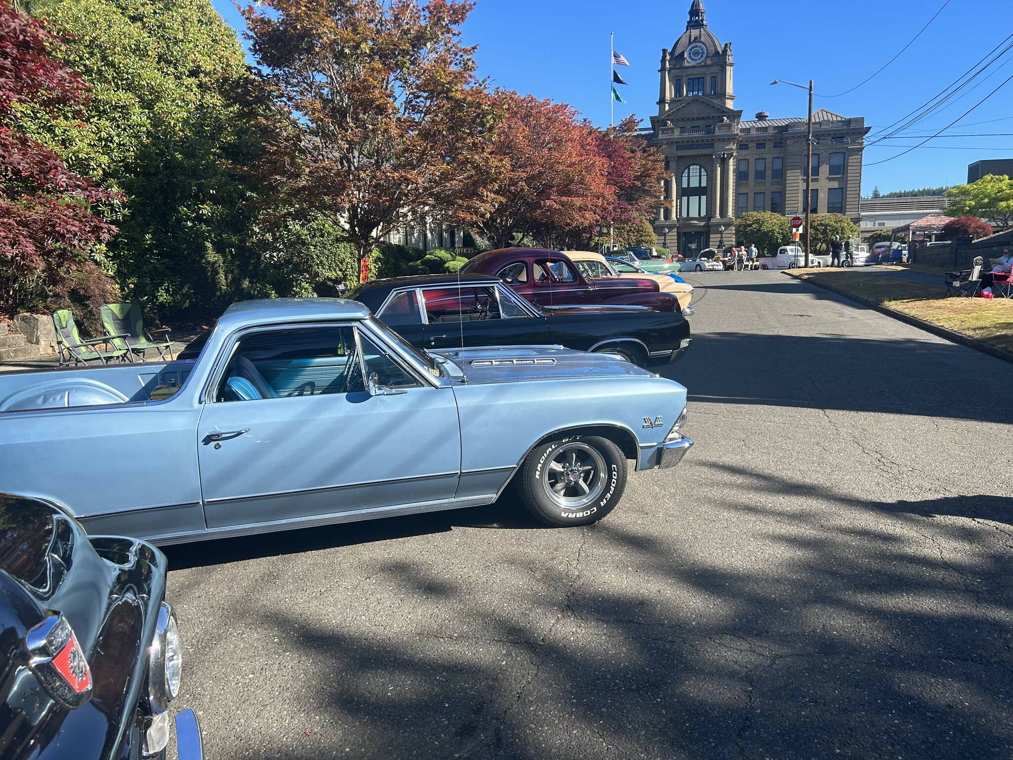 Classic automobiles line the streets in front of the county courthouse for the Historica Montesano Car Show on July 15. (Lillian Saeger / The Daily World)