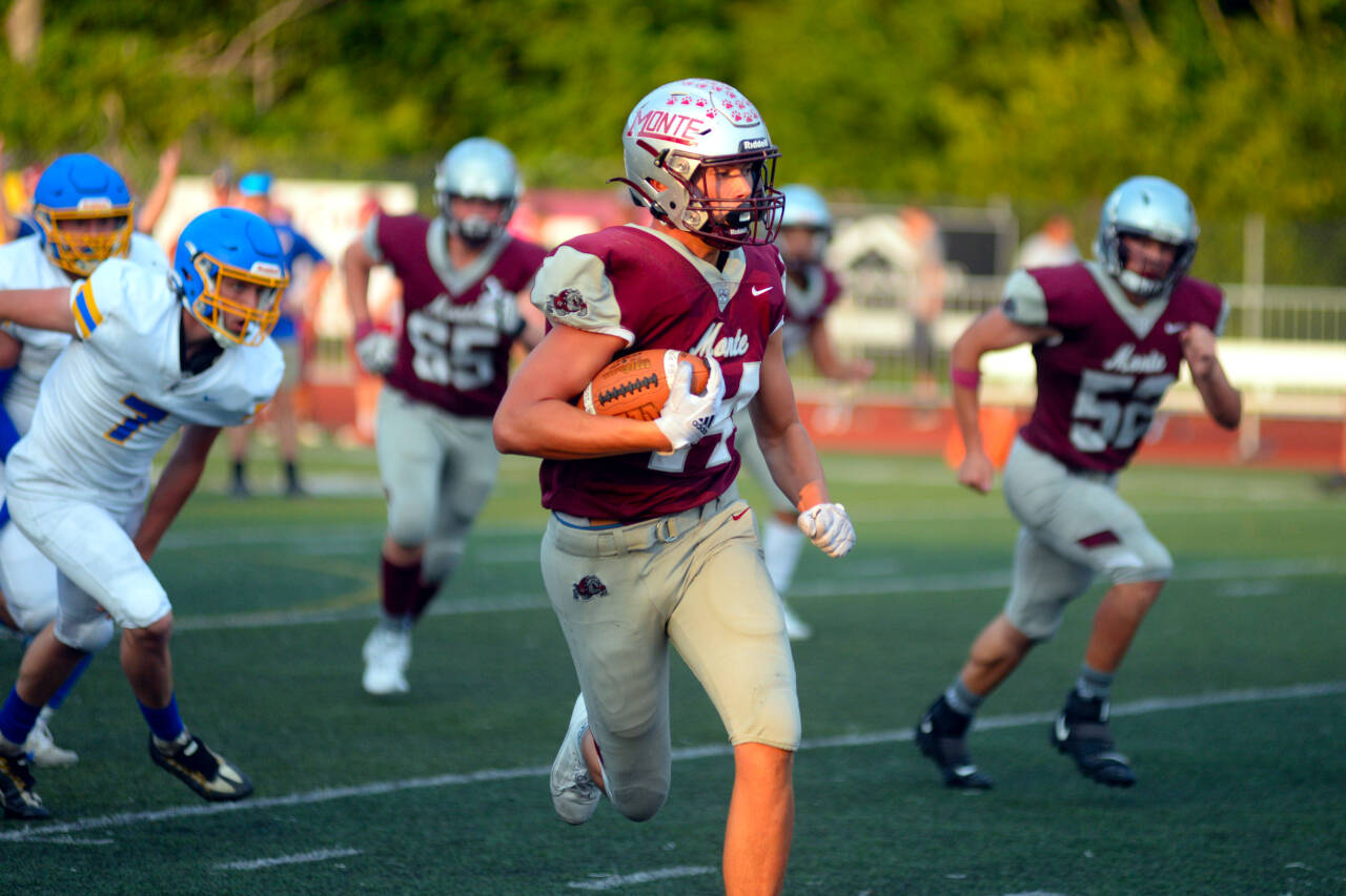 RYAN SPARKS | THE DAILY WORLD Montesano running back Gabe Bodwell breaks free for a 23-yard run against Rochester during the 15th Annual Montesano Jamboree on Friday at Jack Rottle Field.