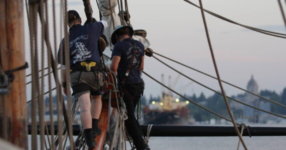 Michael S. Lockett / The Daily World
Sailors aboard the Lady Washington bring in sails as the ship heads in to port in Olympia on September 2.
