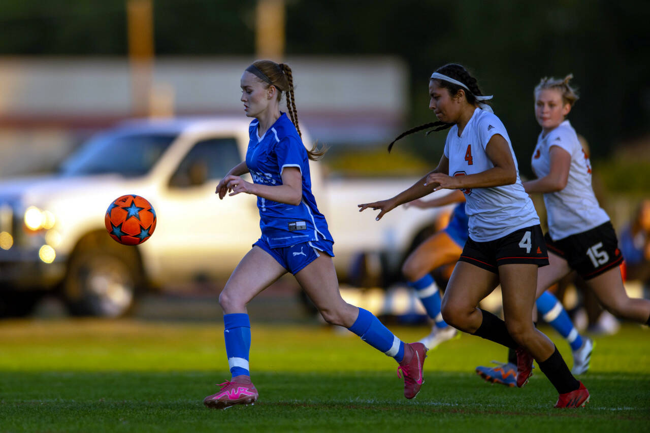 PHOTO BY FOREST WORGUM Elma junior midfielder Valerie Echeverria pulls away from the Centralia defense during a 5-0 win on Thursday in Elma. Echeverria had three goals and two assists in the game.