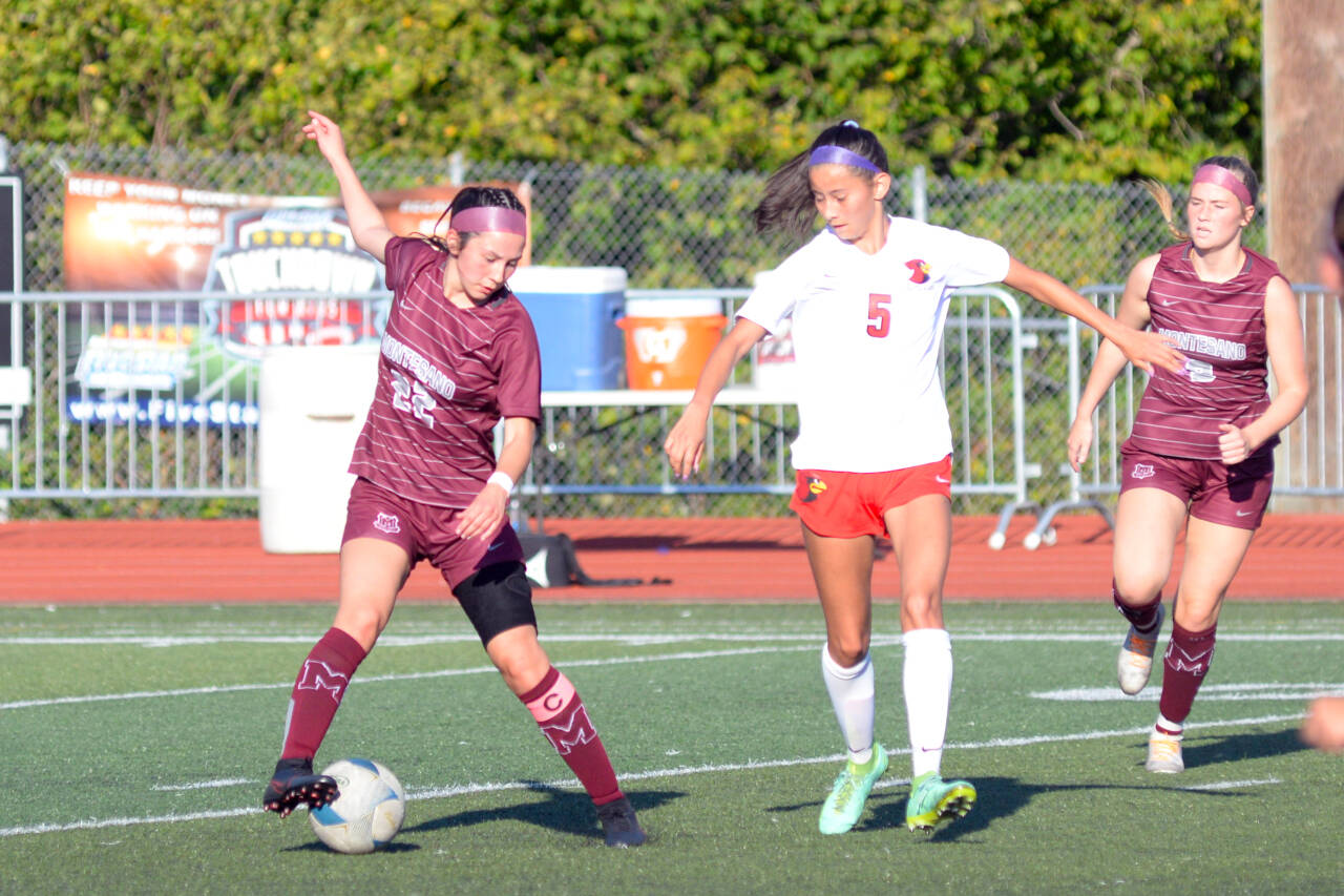RYAN SPARKS | THE DAILY WORLD Montesano midfielder Bethanie Henderson (22) controls the ball against Seattle Academy’s Sena Kwong during the Bulldogs’ 2-1 win (4-2 on penalty kicks) on Saturday in Montesano.