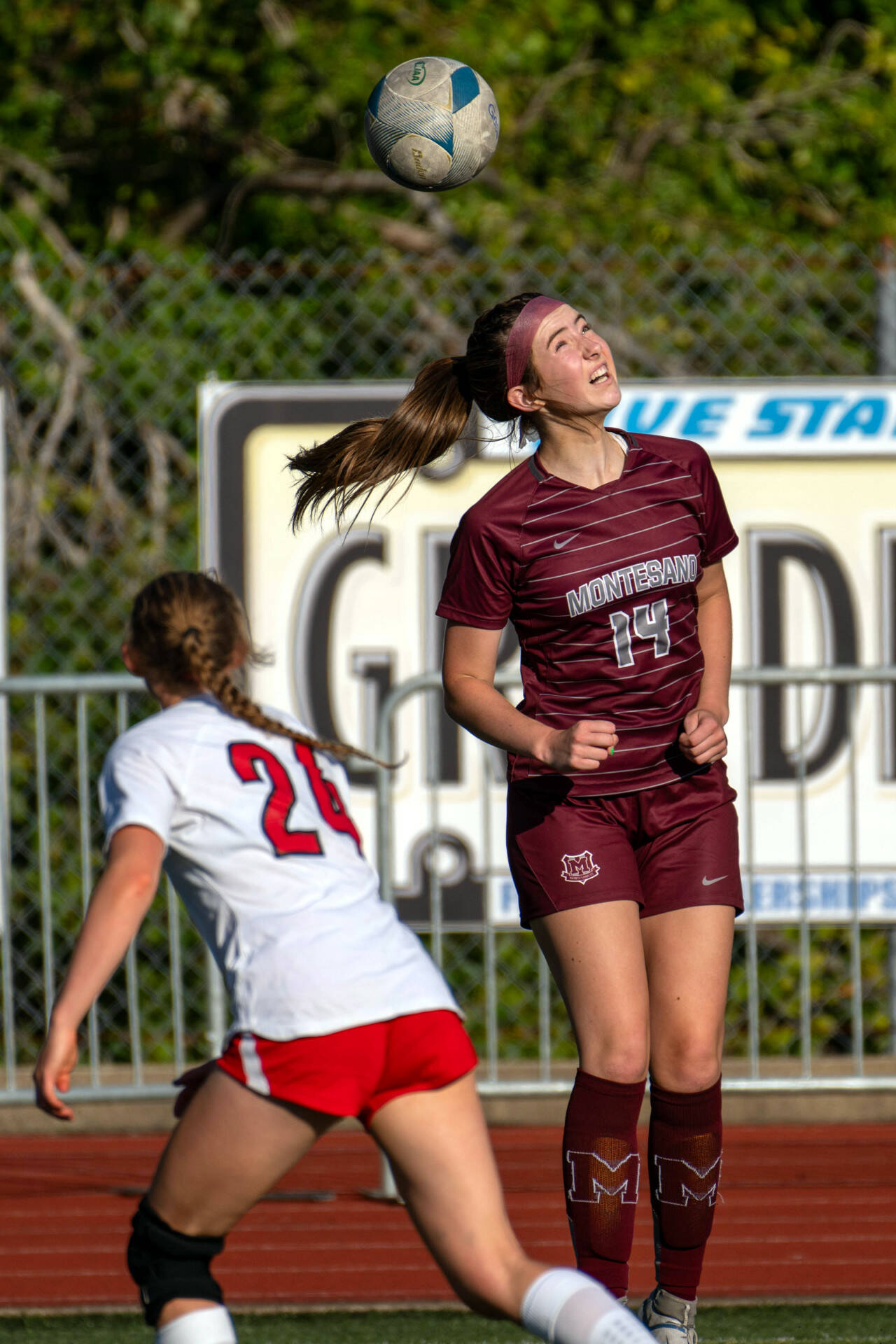 PHOTO BY FOREST WORGUM Montesano midfielder Ava Schrader (14) heads the ball during a 2-1 victory (4-2 on penalty kicks) over Seattle Academy on Saturday in Montesano.