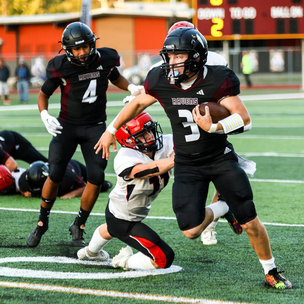 PHOTO BY LARRY BALE 
Raymond-South Bend quarterback Austin Snodgrass (3), seen here against Wahkiakum on Sept. 8, will lead the Ravens against undefeated Ilwaco in a Week 3 matchup.