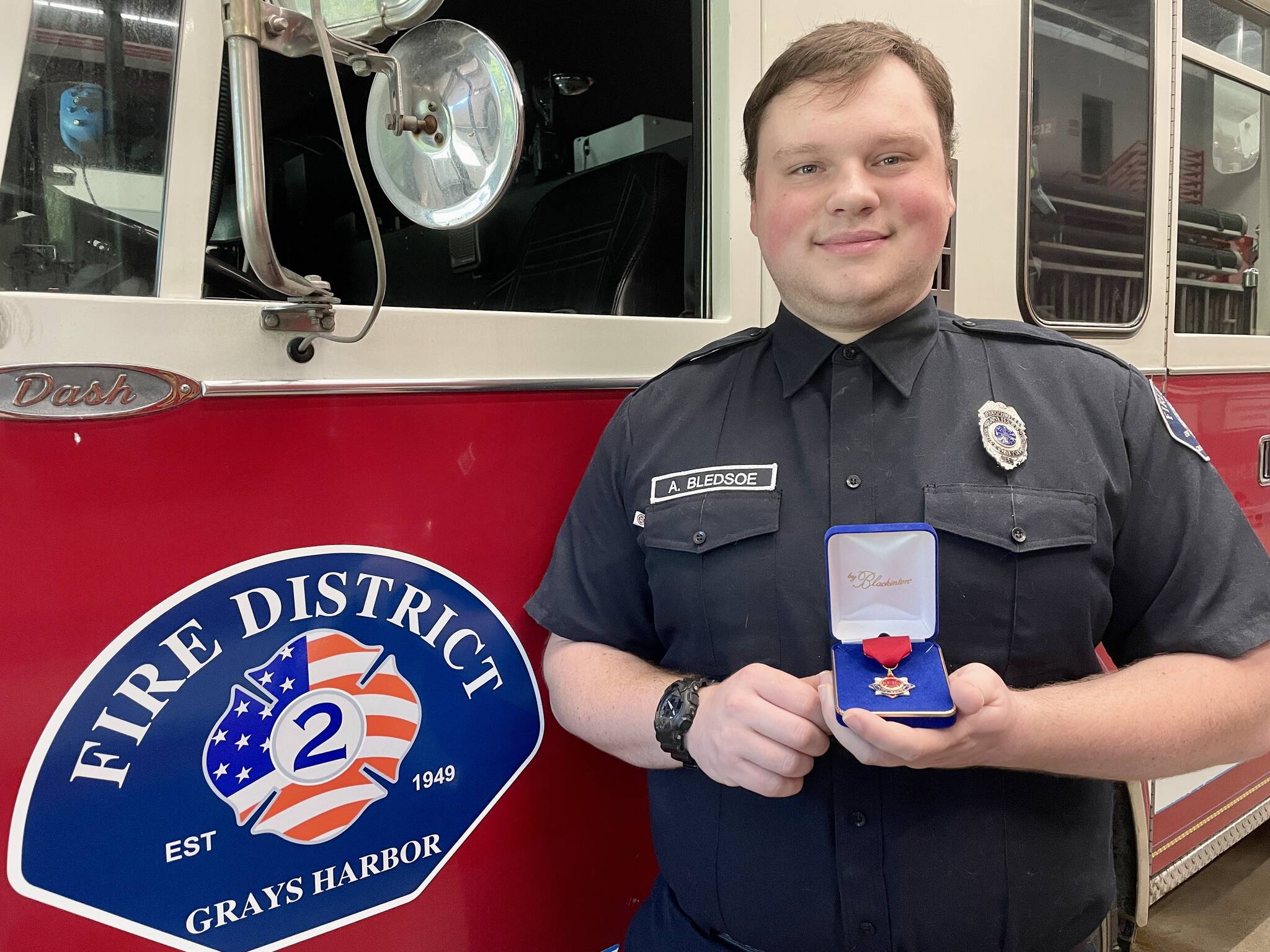 Volunteer Firefighter Aaron Bledsoe was recognized by Grays Harbor Fire District 2 for actions taken in a fire near his home with the Life Saving Medal. (Michael S. Lockett / The Daily World)