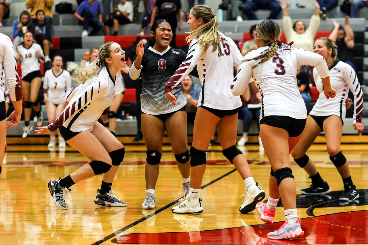 PHOTO BY LARRY BALE The Raymond-South Bend Ravens celebrate a 3-1 victory over Forks on Thursday at Raymond High School.