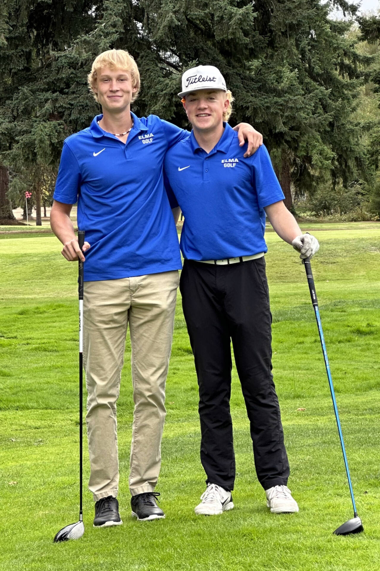 SUBMITTED PHOTO Elma golfers Cason Seaberg, left, and Grant Vessey earned co-Medalist honors with identical scores of 42 in a 185-192 win over King’s Way Christian on Tuesday in Vancouver.