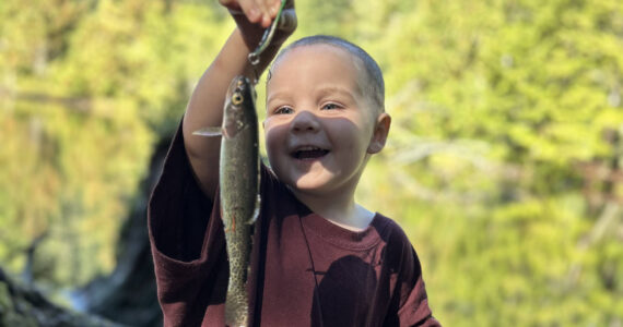 Sterling Hamilton, a little boy from Elma who survived heart surgery at 14 months, is getting bigger by the day. He caught his first rainbow trout recently, according to his dad, Anthony Hamilton. Hamilton couldn't have sounded any happier about his eldest son's development. "He has been doing a great job with making friends," Anthony said. "He can go anywhere and get along with other kids of all ages, and make friends." (Provided photo)