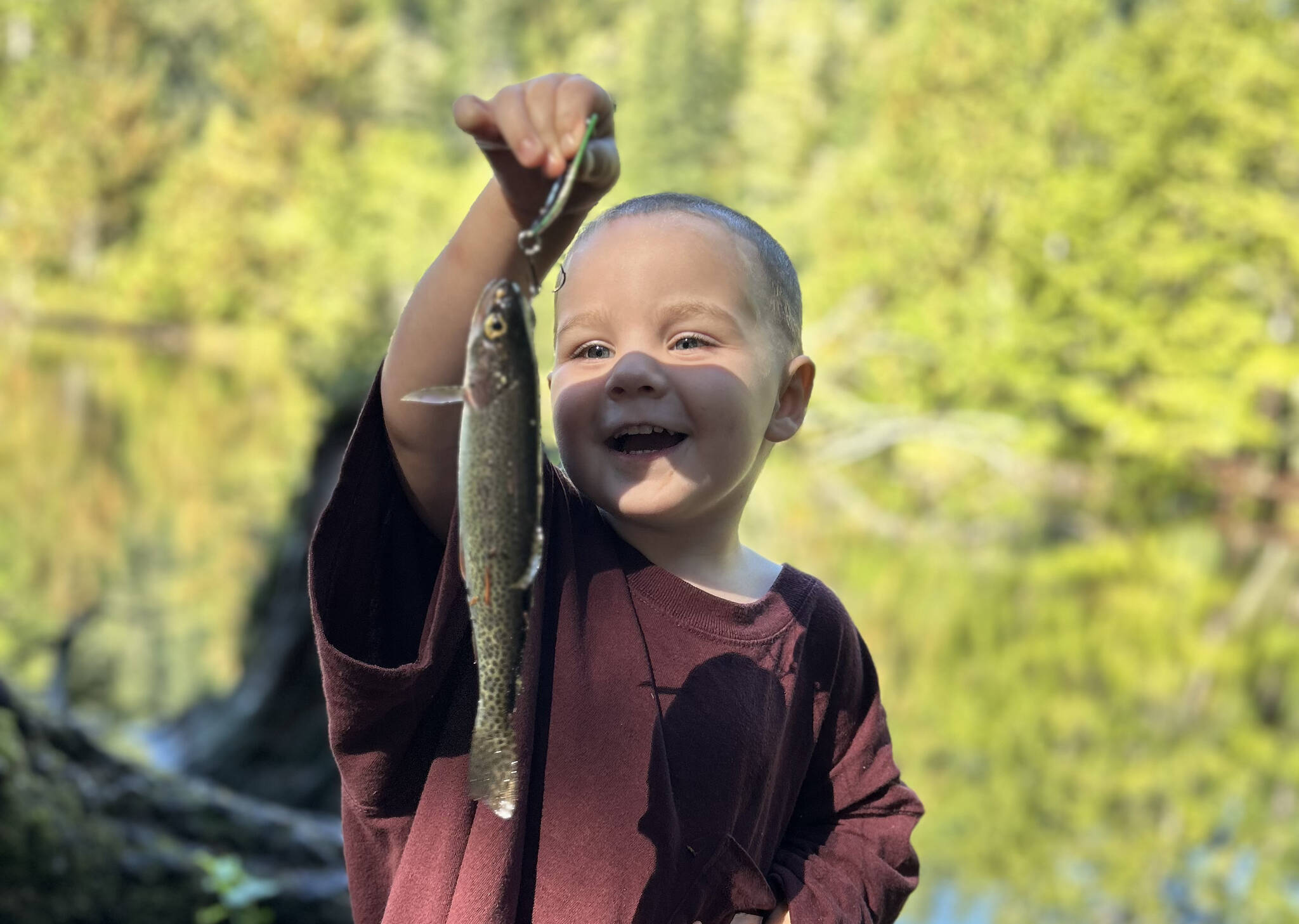 Sterling Hamilton, a little boy from Elma who survived heart surgery at 14 months, is getting bigger by the day. He caught his first rainbow trout recently, according to his dad, Anthony Hamilton. Hamilton couldn't have sounded any happier about his eldest son's development. "He has been doing a great job with making friends," Anthony said. "He can go anywhere and get along with other kids of all ages, and make friends." (Provided photo)