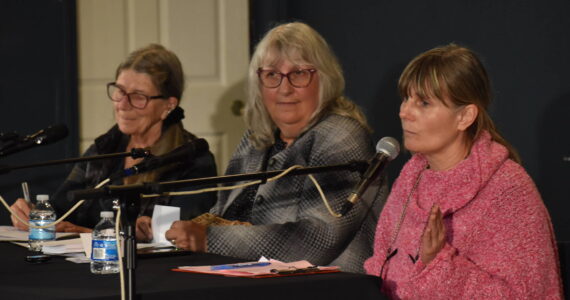 Lisa Griebel, right, speaks at a city council candidate’s forum hosted by Voice of the Shores at the Ocean Shores Lions Club on Wednesday, Oct. 4. Griebel and Susan Conniry, far left, are candidates for Position 3 on the Ocean Shores City Council. (Clayton Franke / The Daily World)