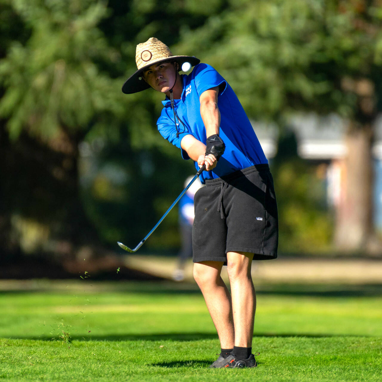 PHOTO BY FOREST WORGUM Elma’s Robby Allen takes an approach shot during a victory over Montesano on Thursday at the Oaksridge Golf Course. Allen earned co-Medalist of the Match with a round of 40.