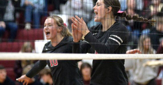 RYAN SPARKS / THE DAILY WORLD 
Montesano’s Jillie Dalan, right, and Kalia Hatton celebrate a point during a 3-1 win over Hoquiam on Tuesday at Bo Griffith Memorial Gymnasium in Montesano.