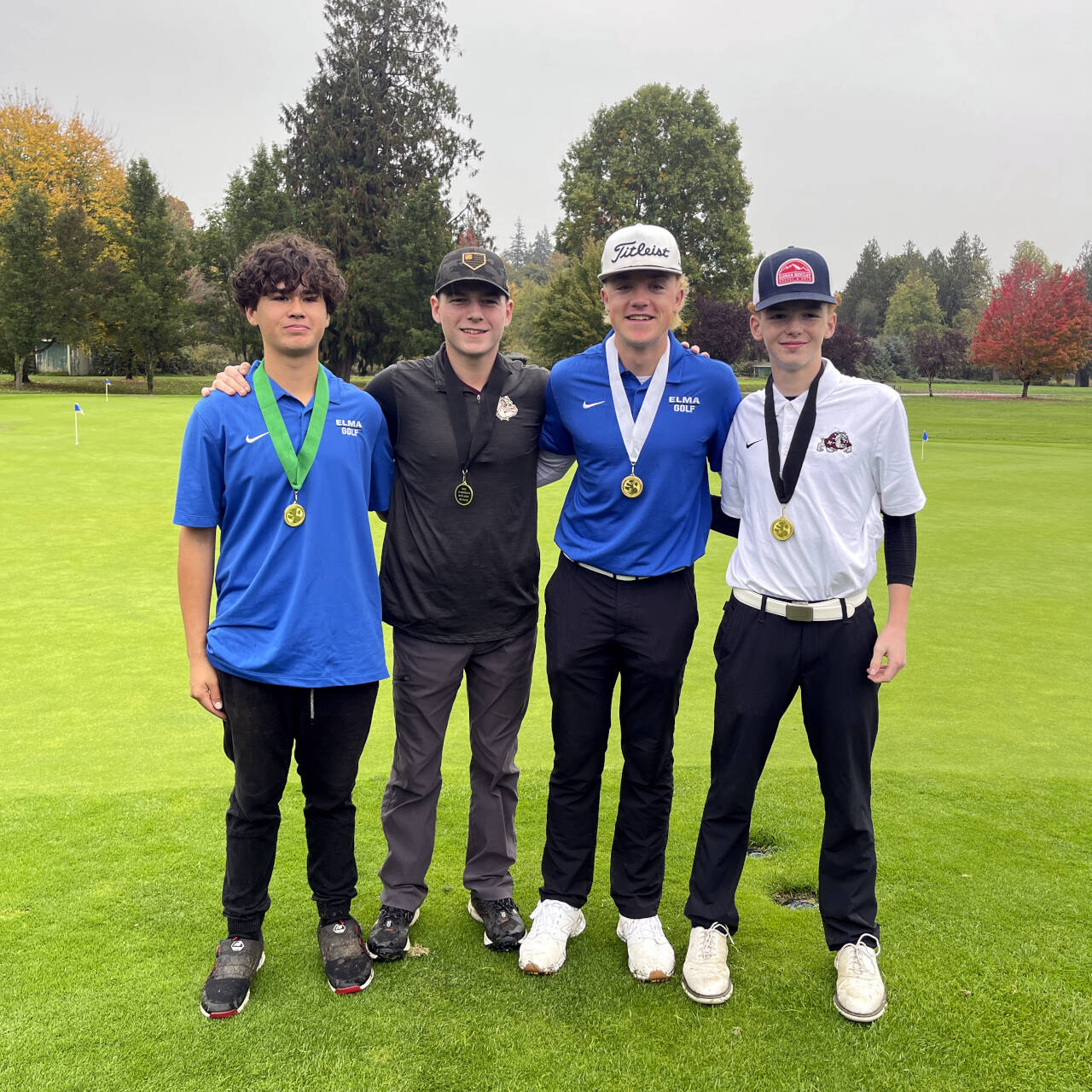 SUBMITTED PHOTO Four of five local boys golf state qualifiers pose for a photo at the conclusion of the 1A District 4 Championships on Tuesday in Tumwater. Pictured are (from left) Elma’s Robby Allen, Montesano’s Colton Grubb, Elma’s Grant Vessey and Montesano’s Ayhden Sauer. Not pictured: Hoquiam’s Riley Montoure.