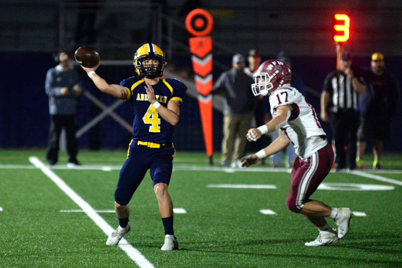 RYAN SPARKS | THE DAILY WORLD Aberdeen quarterback Grady Springer (4) throws a pass against W.F. West linebacker Miles Martin during the Bobcats’ 41-14 loss on Friday at Stewart Field in Aberdeen.