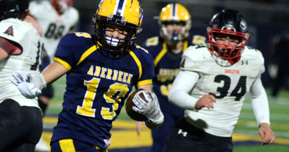 RYAN SPARKS | THE DAILY WORLD Aberdeen senior running back Aidan Watkins (19) rushed for 192 yards in a 26-19 victory over Shelton on Friday in Aberdeen.