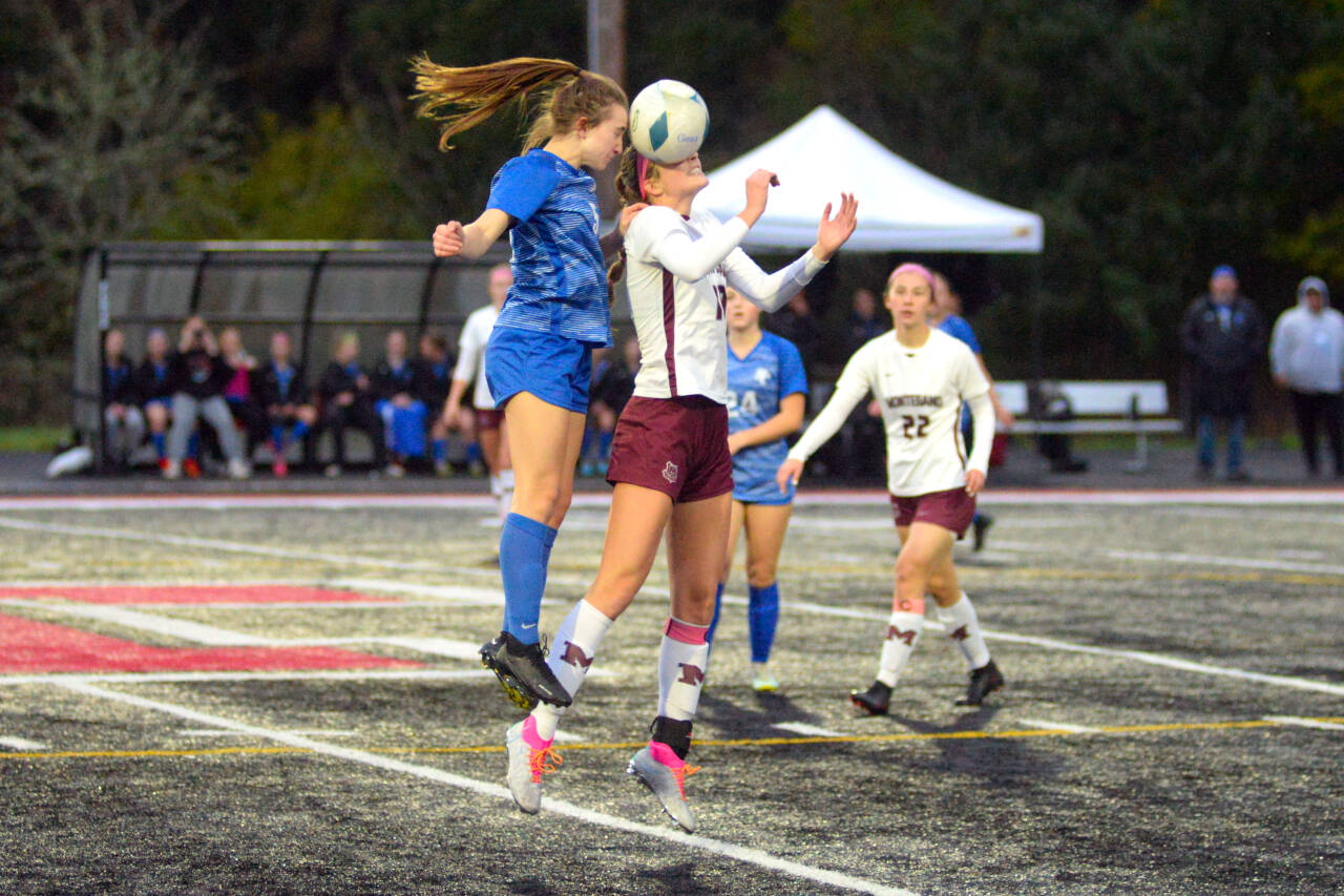 RYAN SPARKS | THE DAILY WORLD Montesano’s Mikayla Stanfield and La Center’s Shaela Bradley, left, compete for a header during the Bulldogs’ 3-0 loss in the 1A District 4 Championship game on Saturday in Tenino.