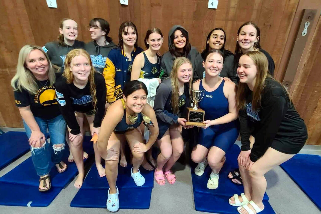 SUBMITTED PHOTO The Aberdeen girls swim and dive team pose for a photo after placing third overall at the 2A/1A District 4 Championship meet on Saturday at Shelton High School.