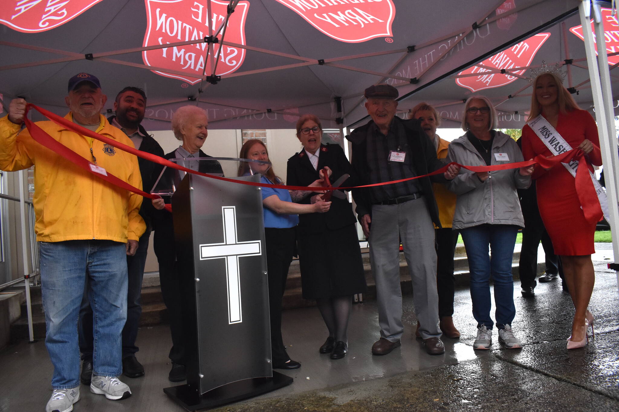 Clayton Franke / The Daily World
Representatives of the Salvation Army, Aberdeen Lions Club, and other community partners celebrate the opening of the Salvation Army’s new client-choice food bank on the corner of G and 2nd Streets in Aberdeen at a ceremony on Monday, Nov. 6.