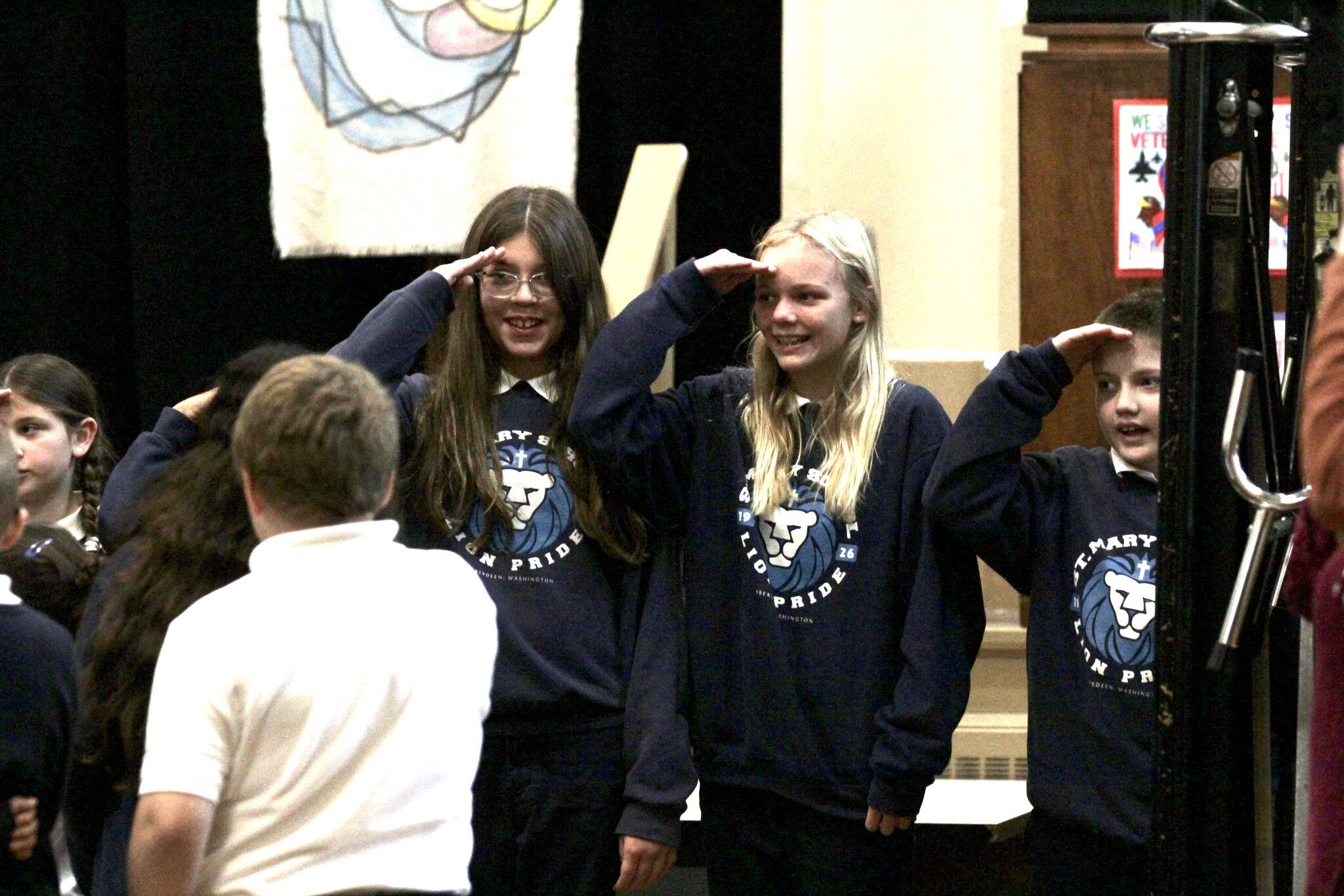 Michael S. Lockett / The Daily World
Students at St. Mary School salute for a Veterans Day assembly on Nov. 9.