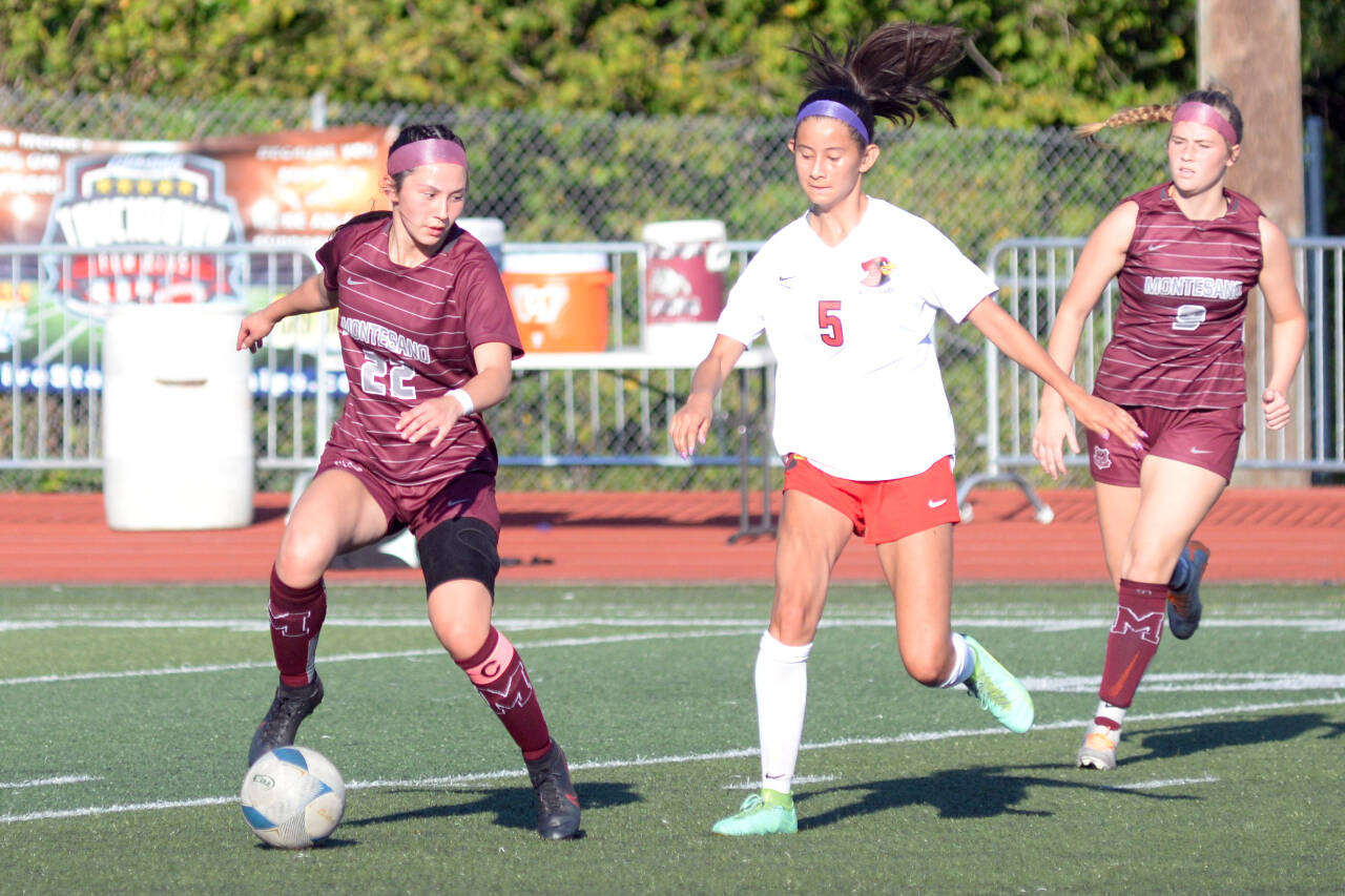 DAILY WORLD FILE PHOTO Montesano midfielder Bethanie Henderson (22) possesses the ball against Seattle Academy in a game on Sept. 9 in Montesano. The Bulldogs face the Cardinals in a 1A State semifinal game on Friday in Tacoma.