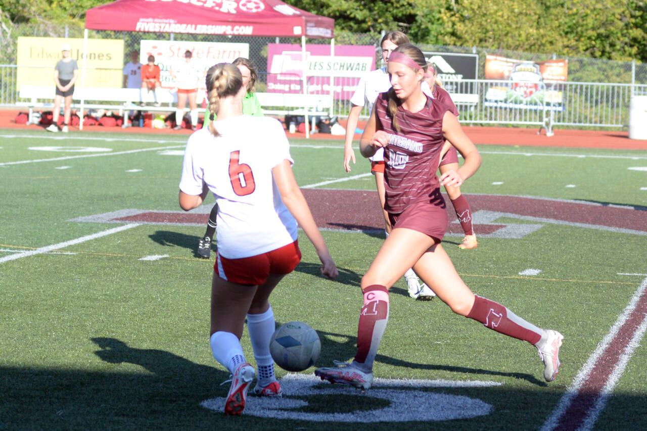 DAILY WORLD FILE PHOTO Montesano senior forward Mikayla Stanfield (10) dribbles against Seattle Academy on Sept. 9. The Bulldogs face the Cardinals in a 1A State semifinal game on Friday in Tacoma.