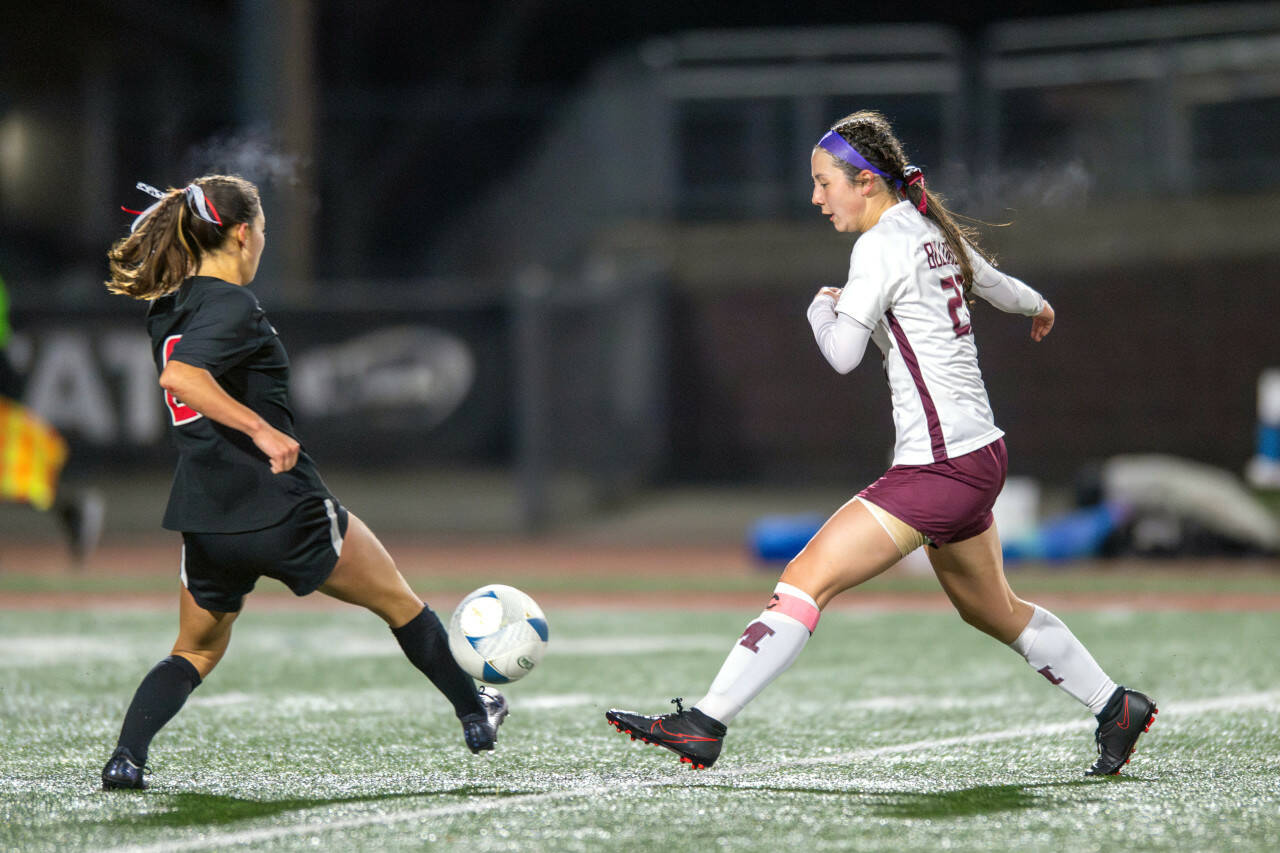 PHOTO BY FOREST WORGUM Montesano midfielder Bethanie Henderson, right, sends the ball forward during the Bulldogs’ 1-0 loss in the 1A State semifinals on Friday at Mount Tahoma Stadium in Tacoma.