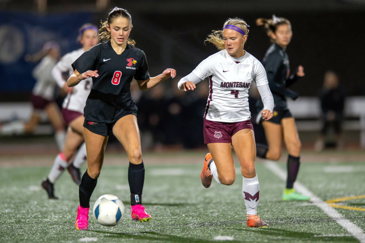 PHOTO BY FOREST WORGUM Montesano midfielder Addi Kersker (4) defends against Seattle Academy’s Isla McNae during the Bulldogs’ 1-0 loss in the 1A State semifinals on Friday at Mount Tahoma Stadium in Tacoma.