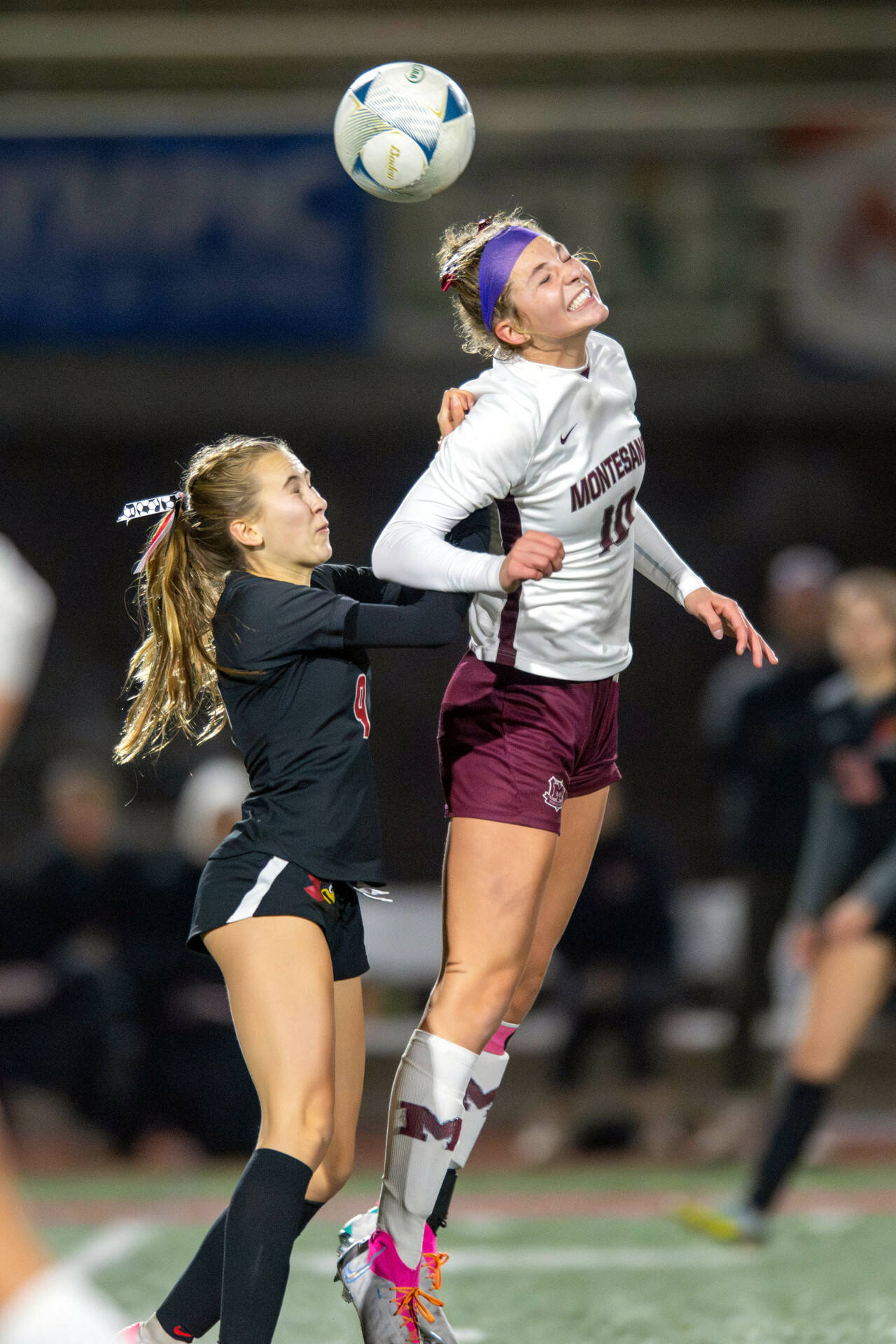 PHOTO BY FOREST WORGUM Montesano senior Mikayla Stanfield (10) heads the ball against Seattle Academy’s Addison Bay during the Bulldogs’ 1-0 loss in the 1A State semifinals on Friday at Mount Tahoma Stadium in Tacoma.