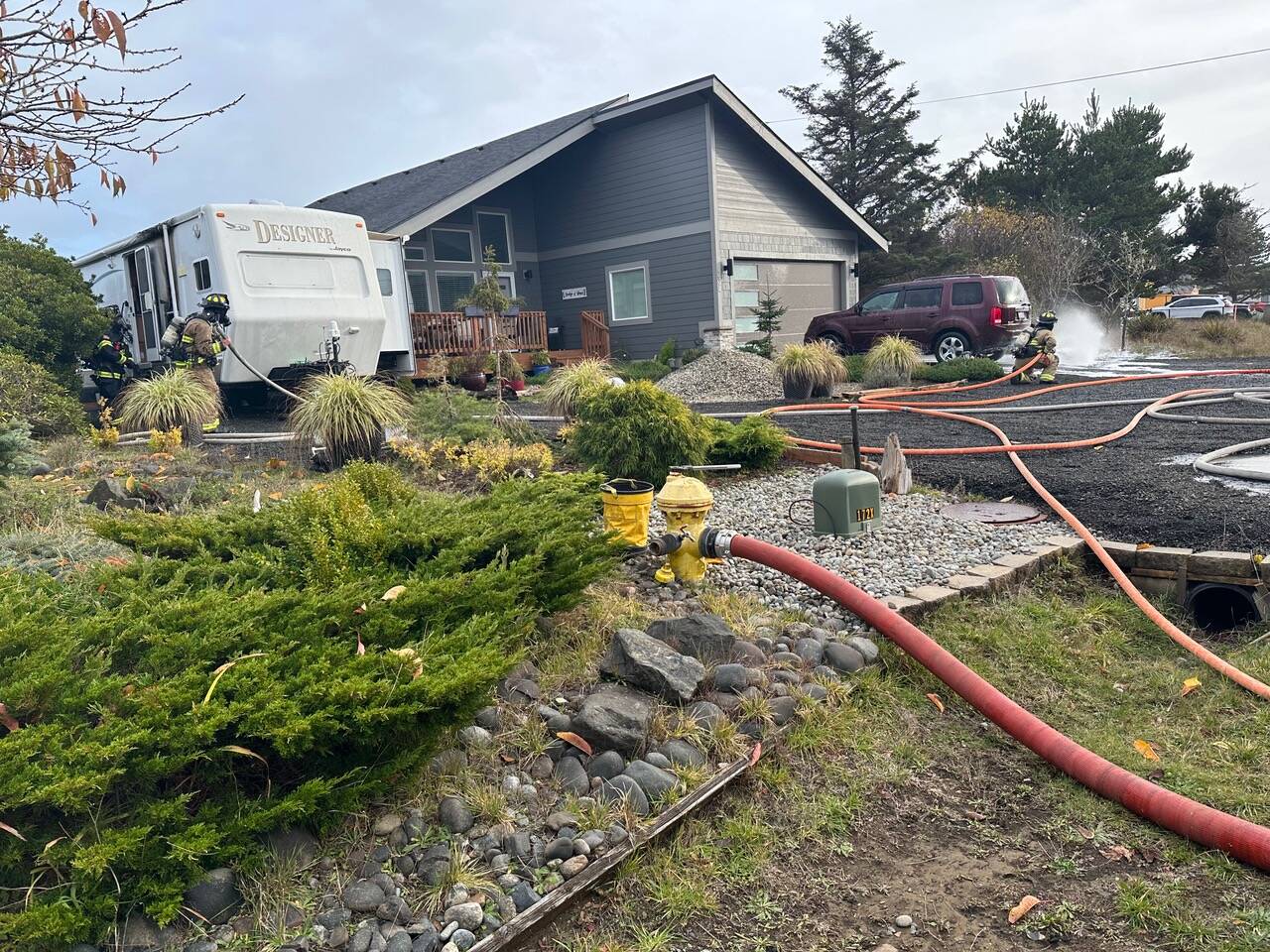 Firefighters from the Ocean Shores Fire Department responded Friday to an RV fire that threatened other buildings. (Courtesy photo / OSFD)