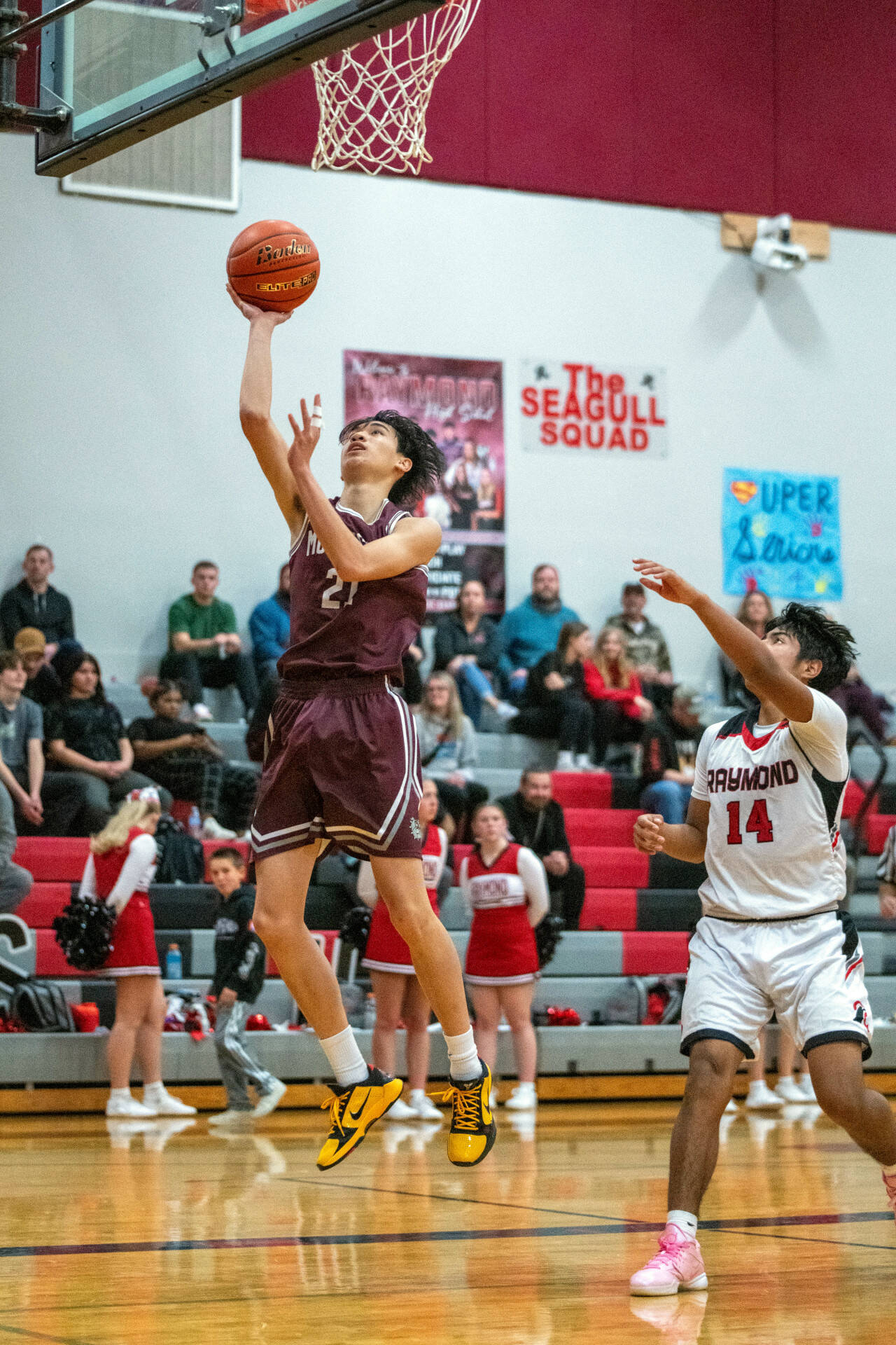 PHOTO BY FOREST WORGUM Montesano guard Delon Chan, left, scores on a layup during a 67-47 win over Raymond on Saturday at Raymond High School. Chan scored 24 points in the victory.