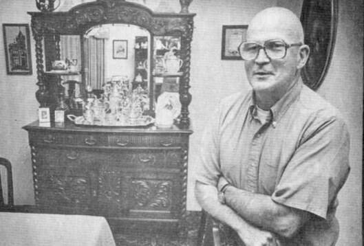 Kathy Quigg / The Daily World file photo
John Anderson, who passed away on Sept. 6, 2023, poses in 1981 with his oak dining room bureau, which his family acquired from the McCleary family, who founded the town in East County.
