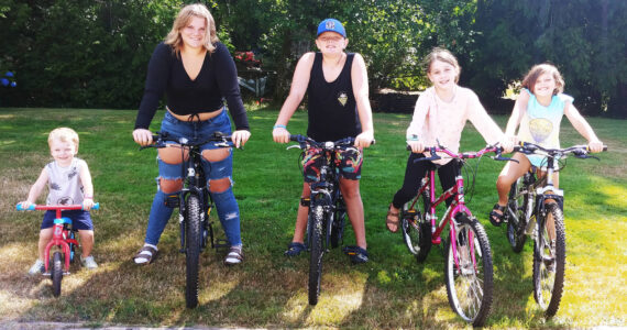Provided photo
From left Jakob DeAlexandro, Chelcee DeAlexandro, Masen Ayres, Ella DeAlexandro and Brooklyn Ayres show off bikes they received from Bicycles from Heaven, a collaboration between the Aberdeen Lions Club, Stafford Creek Corrections Center and the Salvation Army.