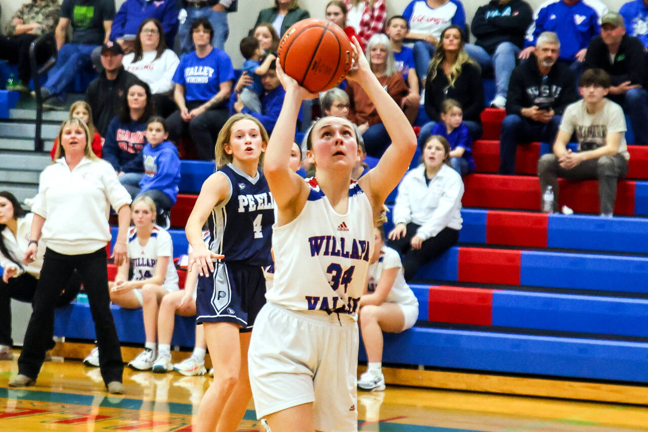 PHOTO BY LARRY BALE Willapa Valley’s Addison Merkel, seen here in a file photo, scores 18 points to lead the Vikings to a 40-28 win over Ocosta on Saturday in Menlo.