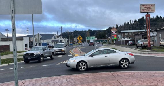 Traffic yields for a driver at the edge of the roundabout on Market Street in Aberdeen. The roundabout could get a facelift in 2024 after the city council approved Aberdeen's Parks and Recreation Director Stacie Barnum to apply for a $50,000 grant from Grays Harbor Community Foundation. While the overall council approved, not everyone was onboard as they cited concerns about safety for the drivers and the pedestrians who use the roundabout. (Matthew N. Wells / The Daily World)