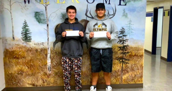 SUBMITTED PHOTO 
Lake Quinault football players Jacob Taylor, left, and Kevin Mendoza were selected to receive $1,000 scholarships as Lake Quinault was awarded the South Sound Football Officials Association’s Sportsmanship Award for the 2023 season.