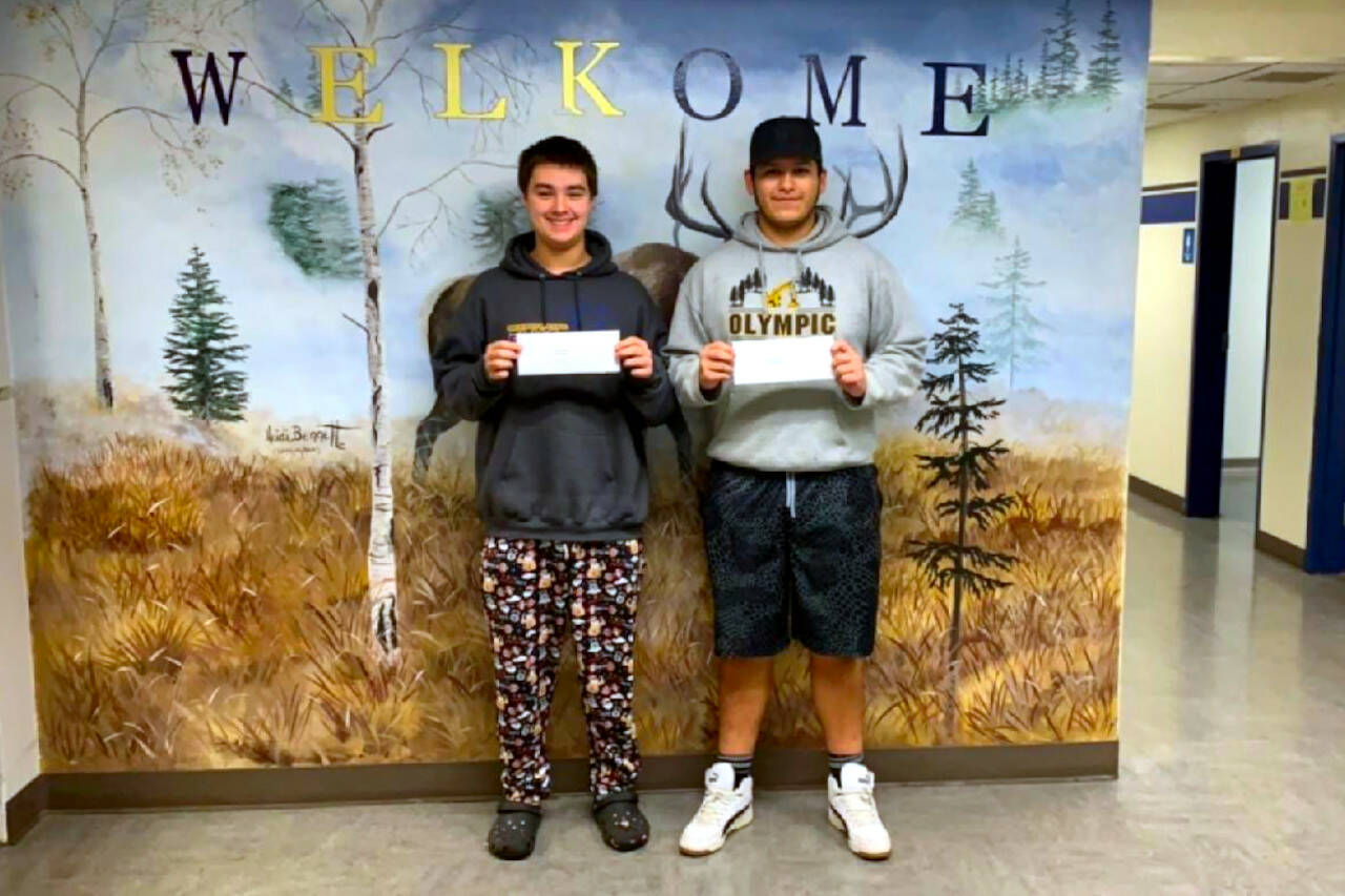 SUBMITTED PHOTO 
Lake Quinault football players Jacob Taylor, left, and Kevin Mendoza were selected to receive $1,000 scholarships as Lake Quinault was awarded the South Sound Football Officials Association’s Sportsmanship Award for the 2023 season.