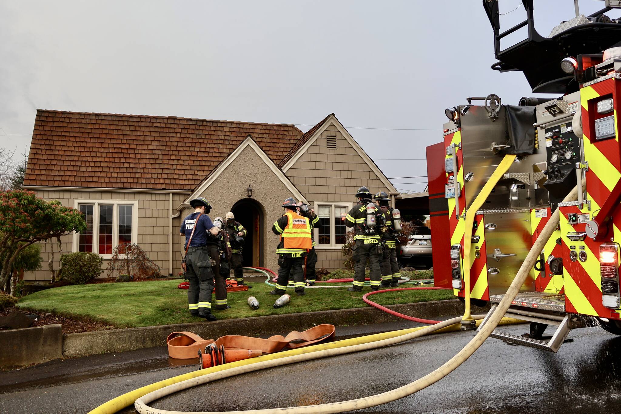 Firefighters fight a house fire in Aberdeen on Thursday morning. (Michael S. Lockett / The Daily World)