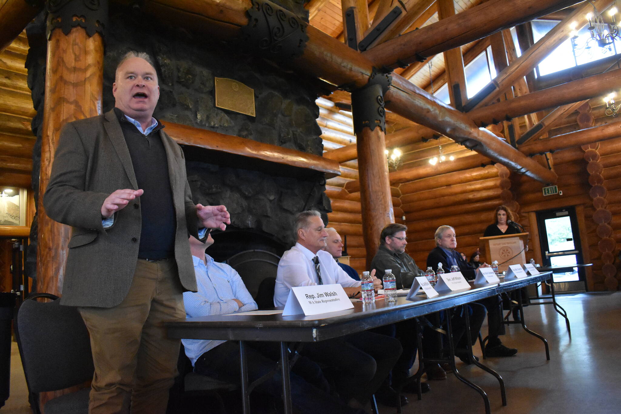 Rep. Jim Walsh, R-Aberdeen, left, speaks during a legislative "send-off" event hosted by Greater Grays Harbor, Inc on Friday, Jan. 5. All six state legislators from the 19th and 24th districts were in attendance. (Clayton Franke / The Daily World)