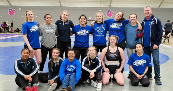 SUBMITTED PHOTO Grays Harbor College women’s wrestling team placed fourth overall at the Mat Cat Invitational on Sunday in McMinnville, Oregon. Pictured are (front row, from left): Maysa Brown, Hailee Stoken, assistant coach Morgan Shines, Courtney Jones, Declyn Foster, Gloria Hudson. Back row: Elizabeth Patana, Marissa Riojas, Alexandria Kauffman-Templeton, Nancy Frayle, Aliya Hammons, Renaeh Ureste, Cassidy Rehder, head coach Kevin Pine.