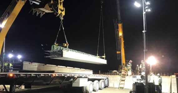 Courtesy photo / WSDOT
Ceccanti, Inc. crews overnight unload concrete girders onto WSDOT’s fish barrier removal project.